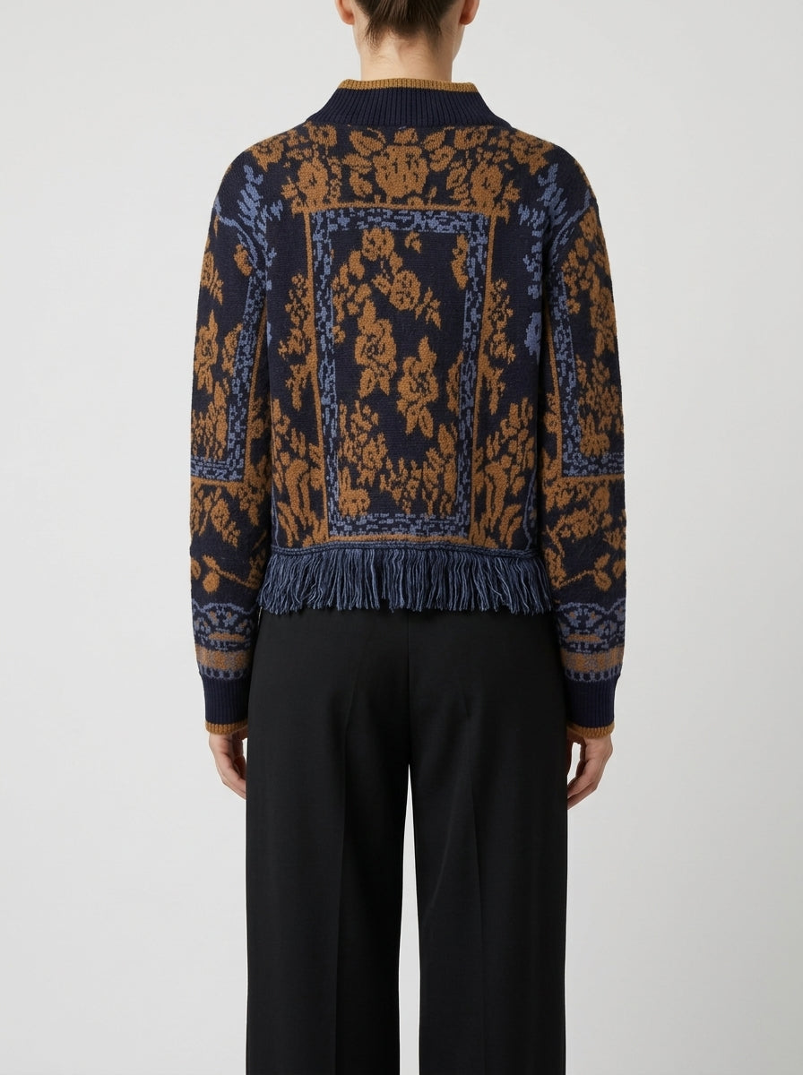 Girocollo in lana blu con intarsi jacquard e frange 