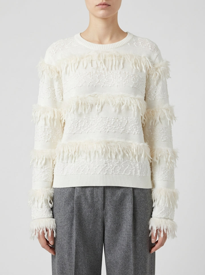 Pullover girocollo panna con  trasparenze e frange 