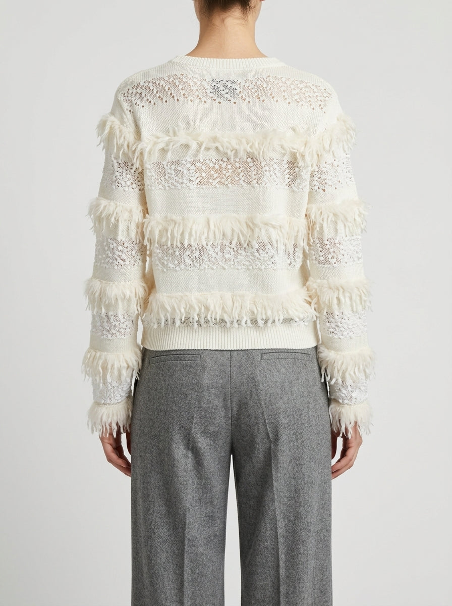 Pullover girocollo panna con  trasparenze e frange 