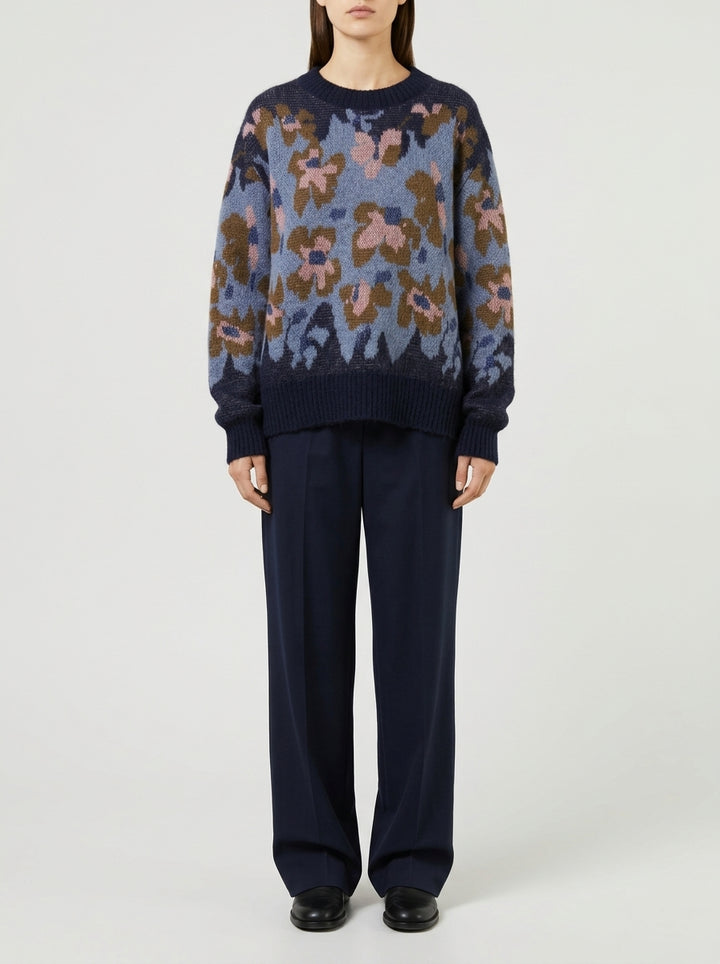 Pullover girocollo in lana blu con ricami a contrasto 