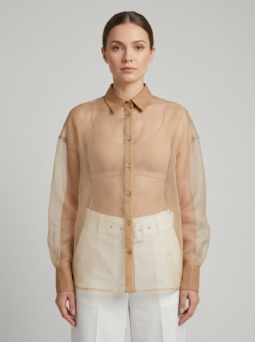 Camicia  in organza nude con maniche a sbuffo 