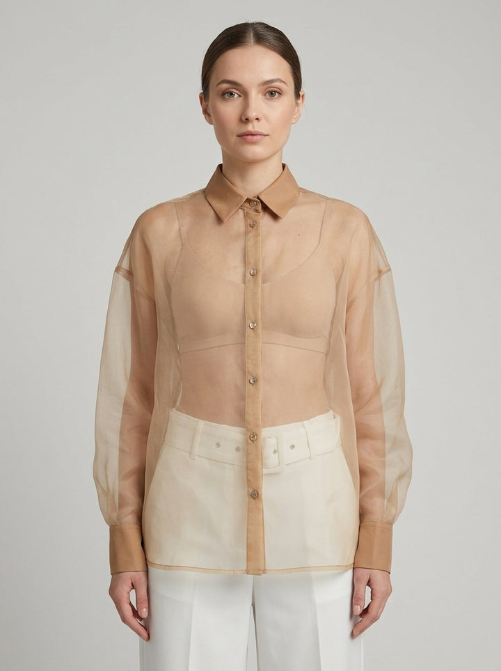 Camicia  in organza nude con maniche a sbuffo 