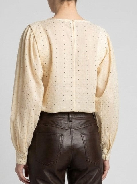 Blusa ecru con micro pois glitter e volant sulle spalle 