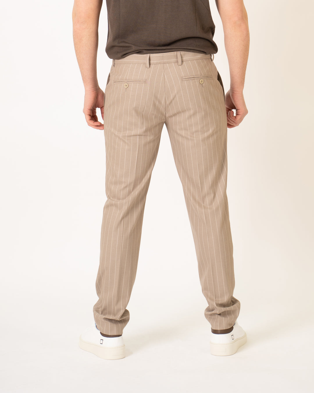Beige pinstriped trousers
