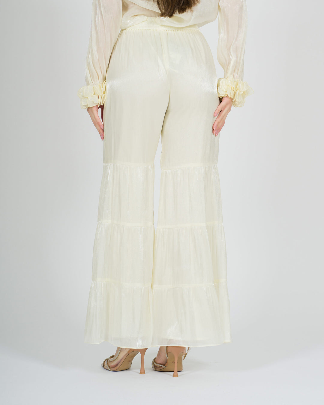 Pantalone panna amosa  modello zampa con balze 