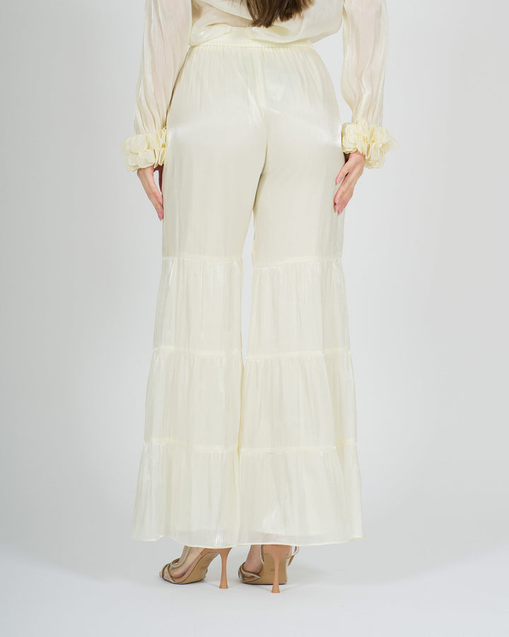 Pantalone panna amosa  modello zampa con balze 