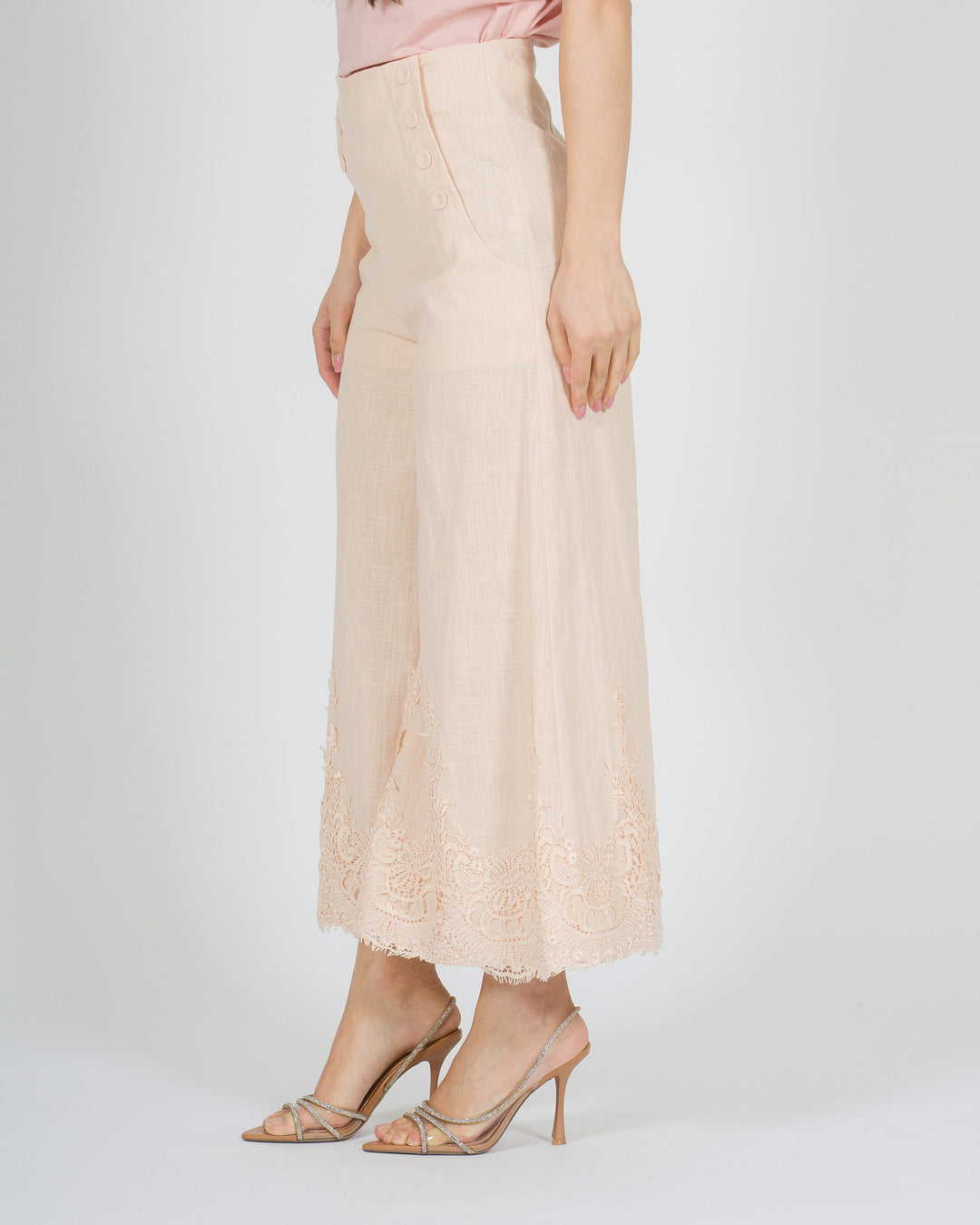 Pantalone gaucho rosa in lino con pizzo finale 