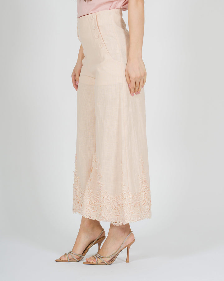 Pantalone gaucho rosa in lino con pizzo finale 