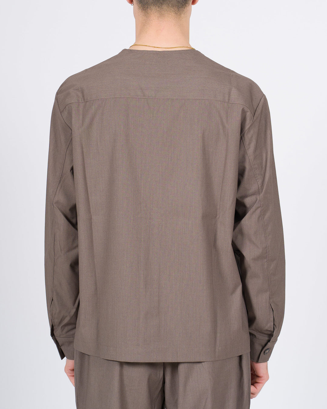 Giacca con bottoni in fibra naturale color fango 