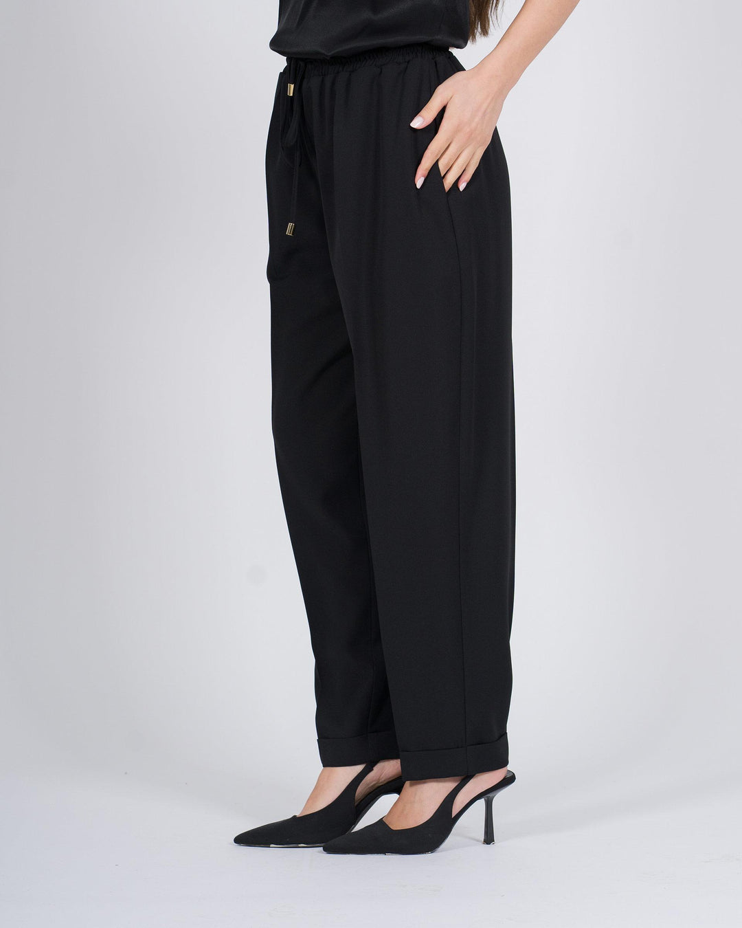 Pantaloni con vita elasticizzata e polsini nero 
