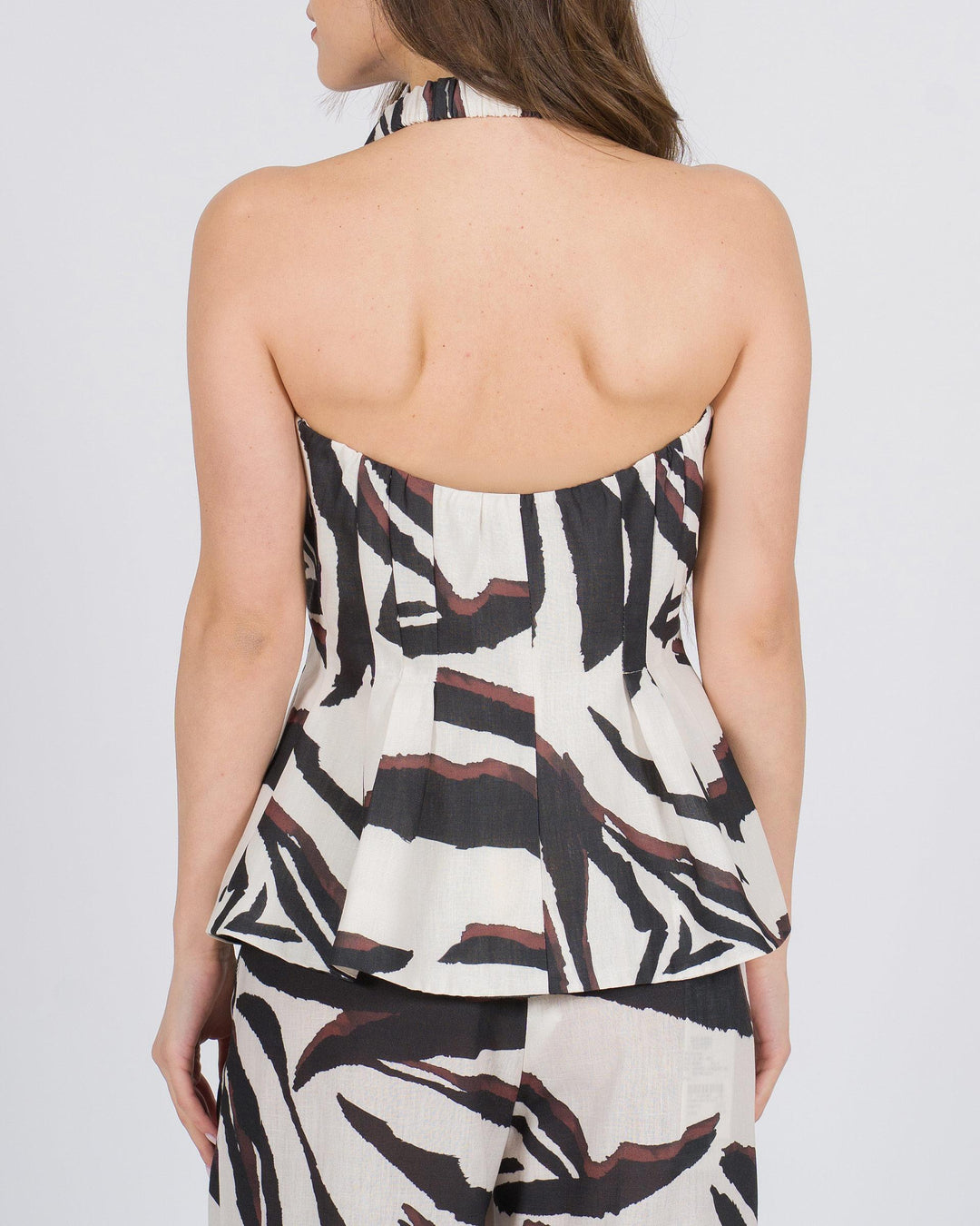 Top gilet peplum stampato animalier nero 