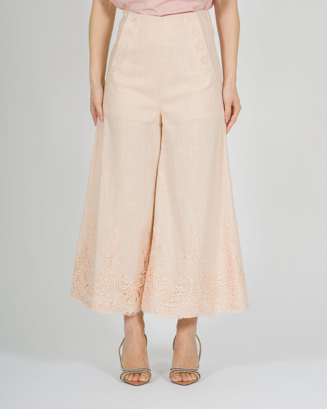 Pantalone gaucho rosa in lino con pizzo finale 