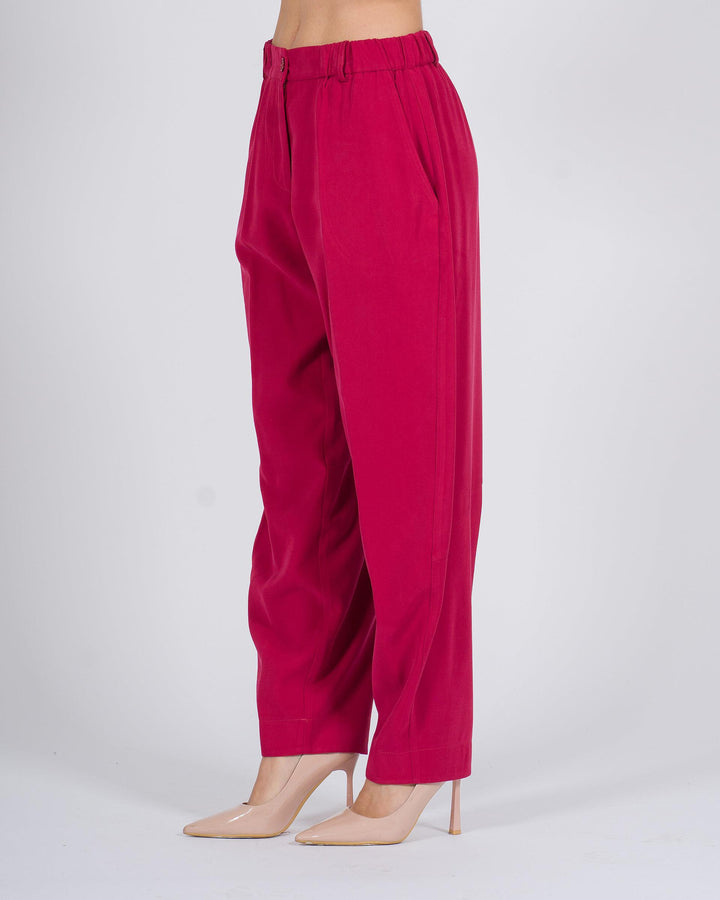 Pantaloni carrot-fit con vita elasticizzata fuxia 