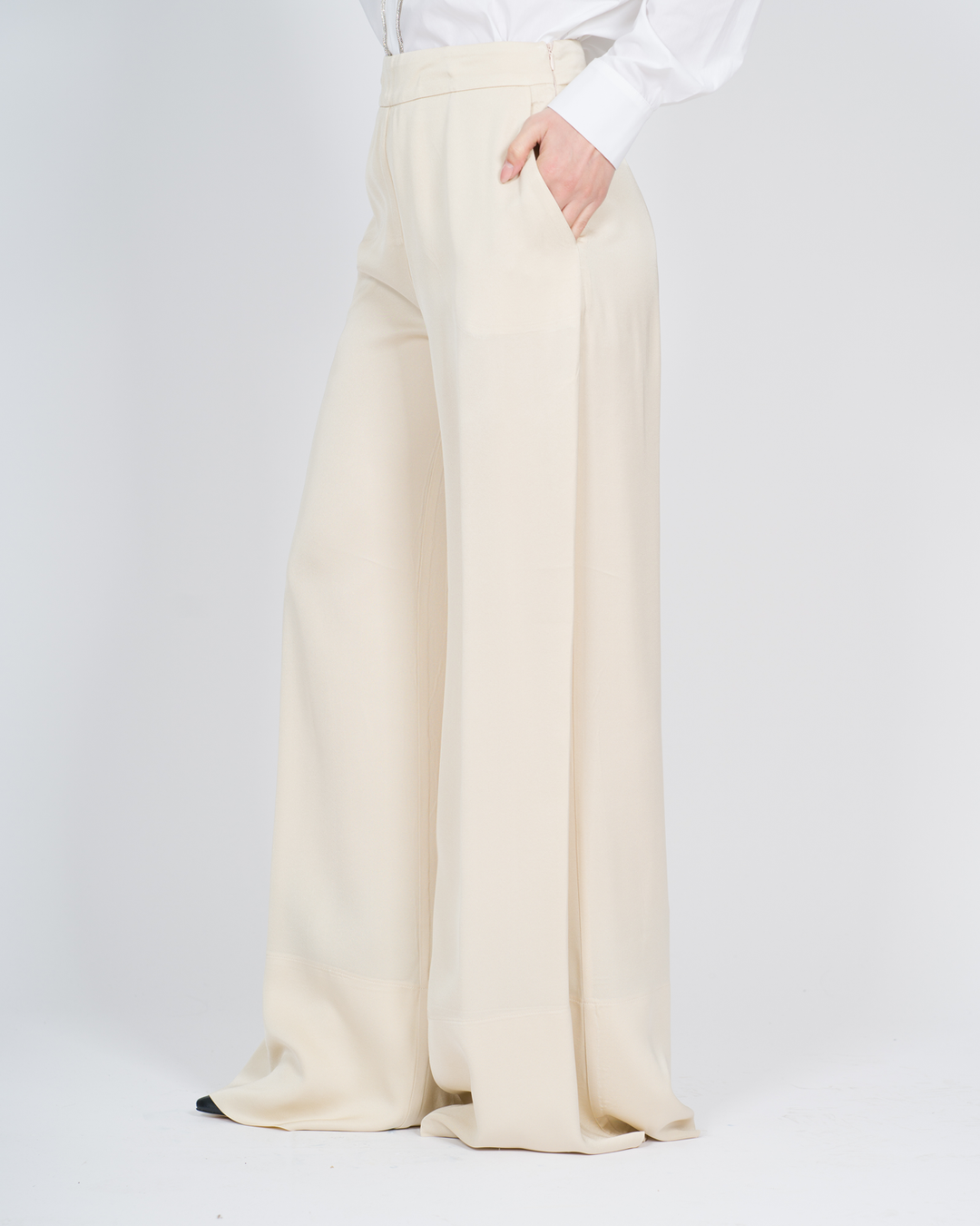 Pantaloni con cuciture decorative panna 