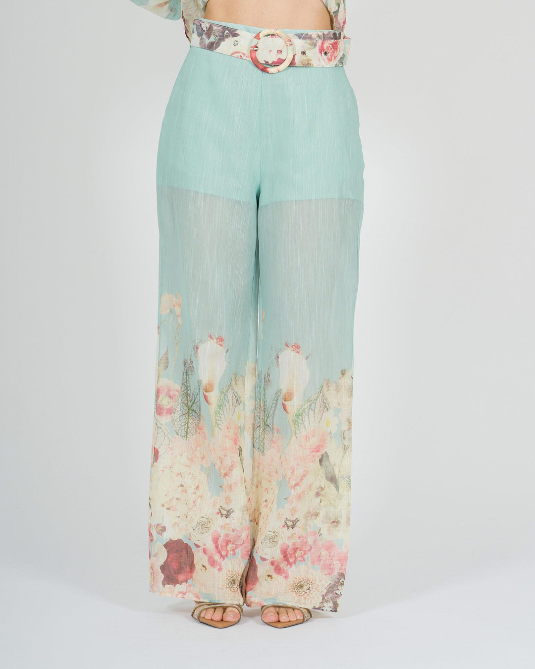 Pantalone azzurro amosa  in cotone leggero con stampa floreale 