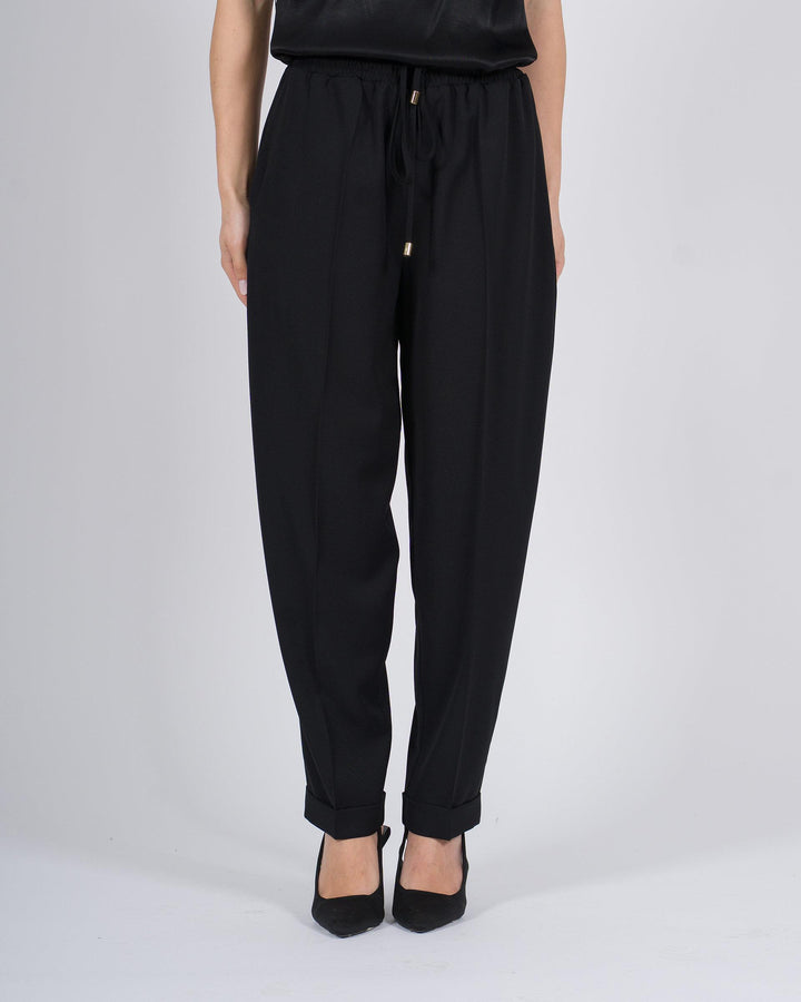 Pantaloni con vita elasticizzata e polsini nero 