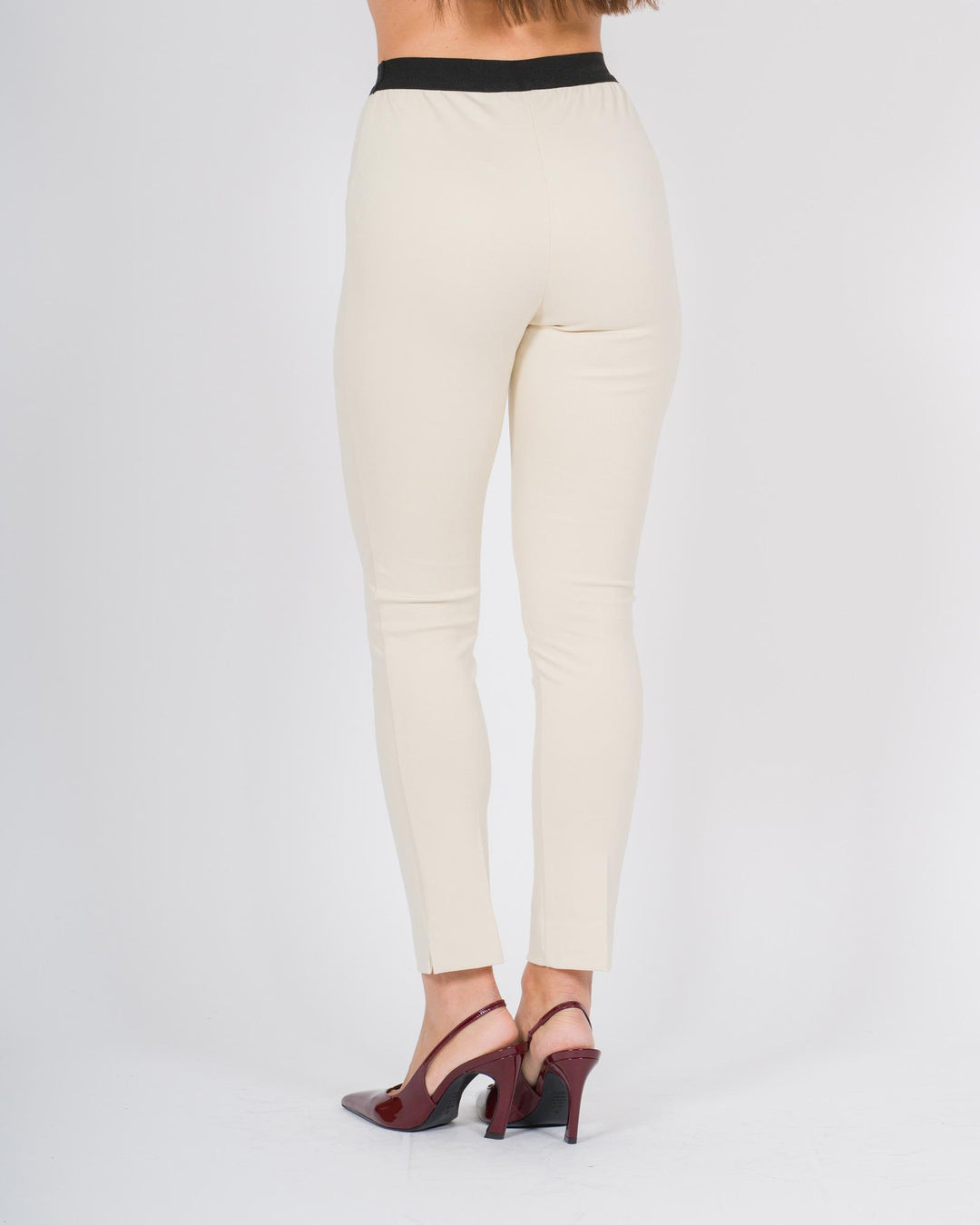 Pantalone bianco skinny con bustino in contrasto 