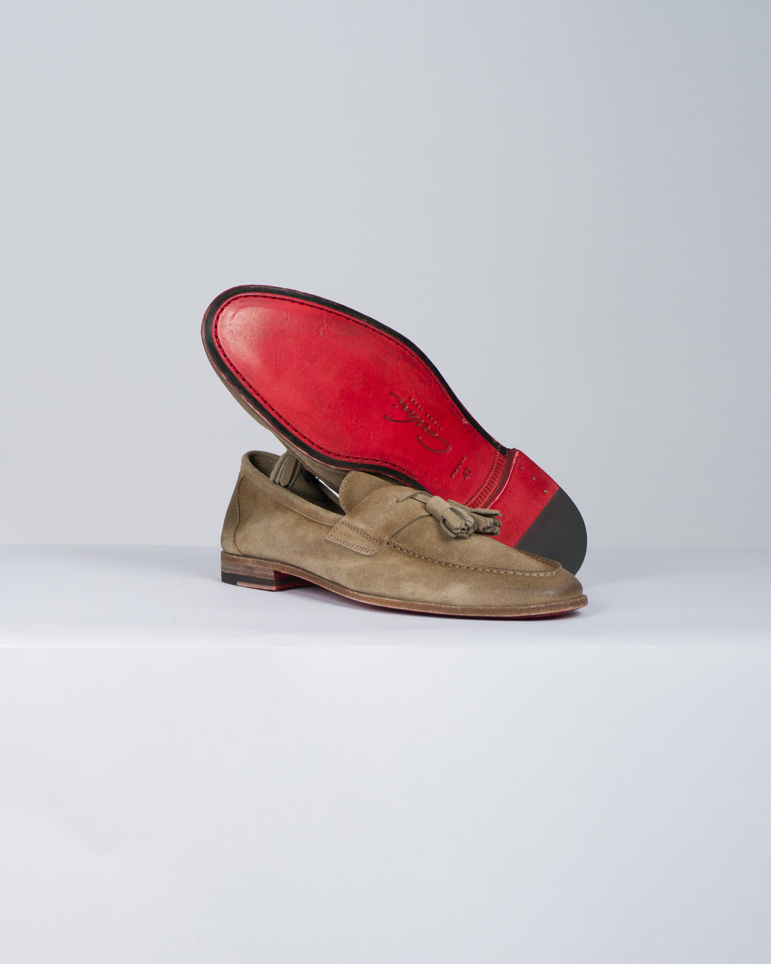 Mocassino camoscio con nappine 