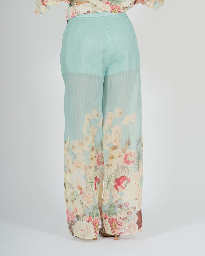 Pantalone azzurro amosa  in cotone leggero con stampa floreale 