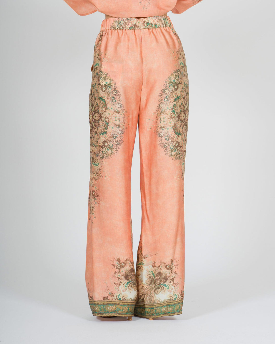 Pantalone amosa arancio in raso modello palazzo con stampa 