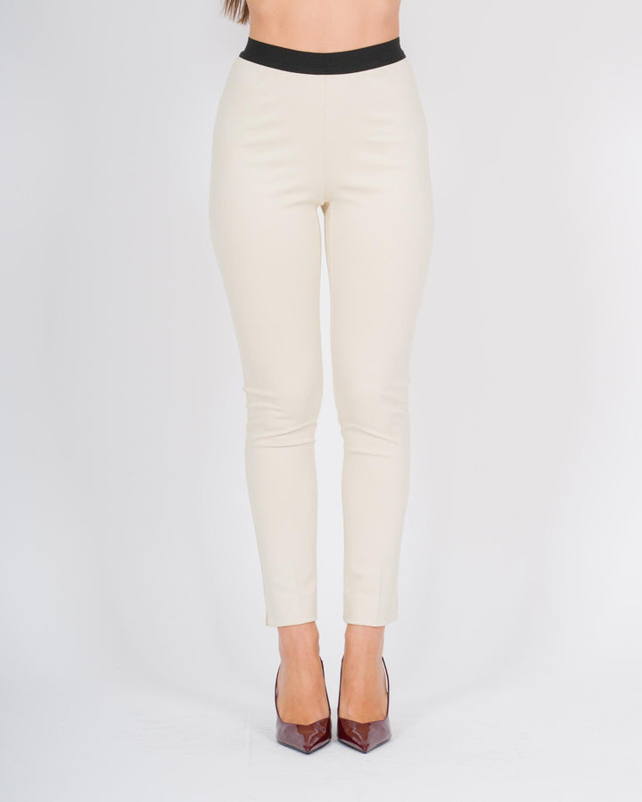 Pantalone bianco skinny con bustino in contrasto 