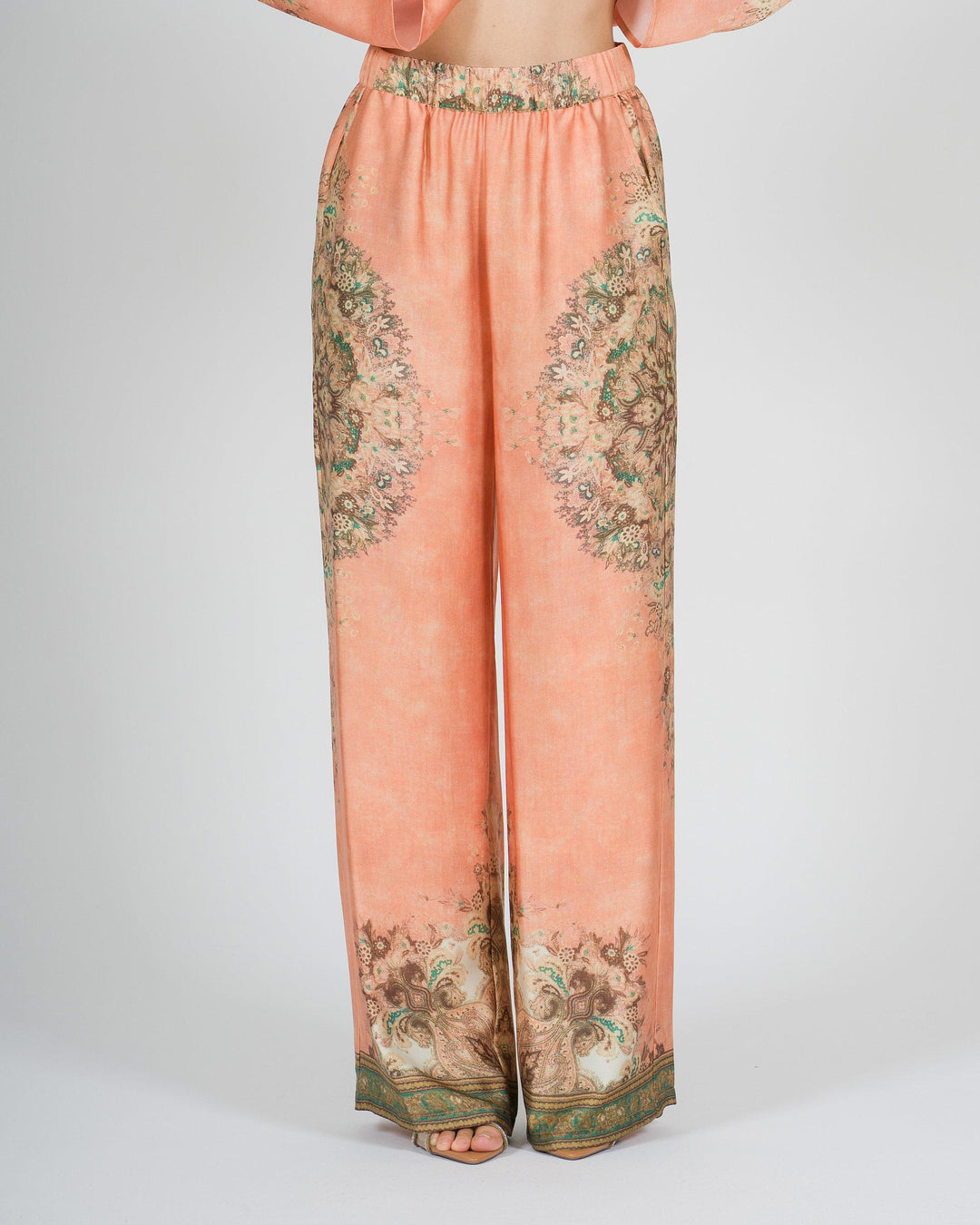 Pantalone amosa arancio in raso modello palazzo con stampa 