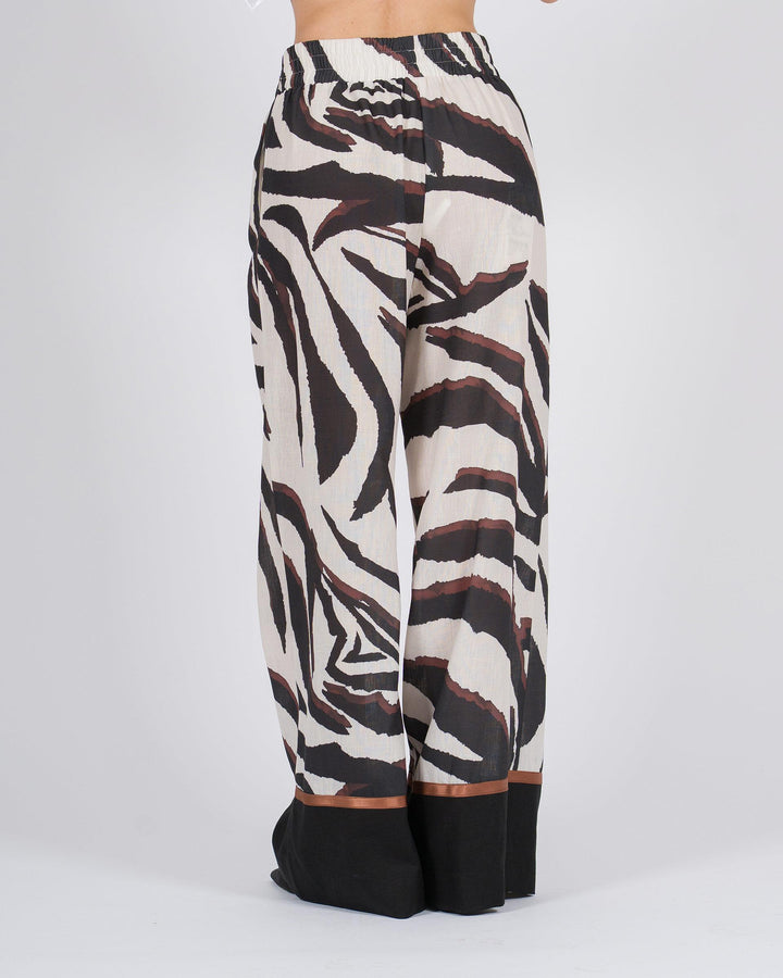 Pantaloni stampati con vita elasticizzata animalier neri 