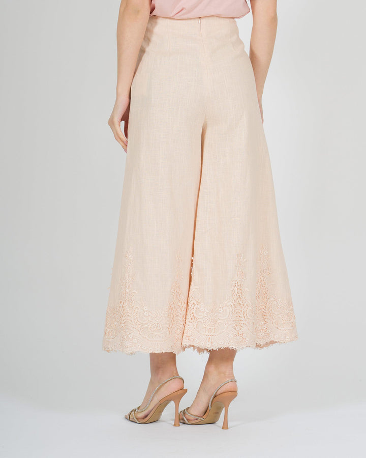 Pantalone gaucho rosa in lino con pizzo finale 