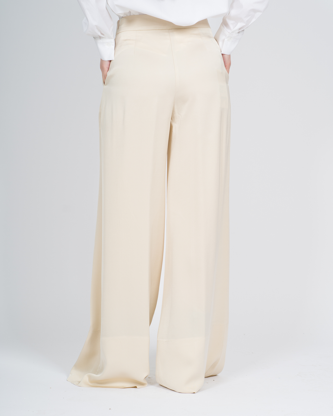 Pantaloni con cuciture decorative panna 