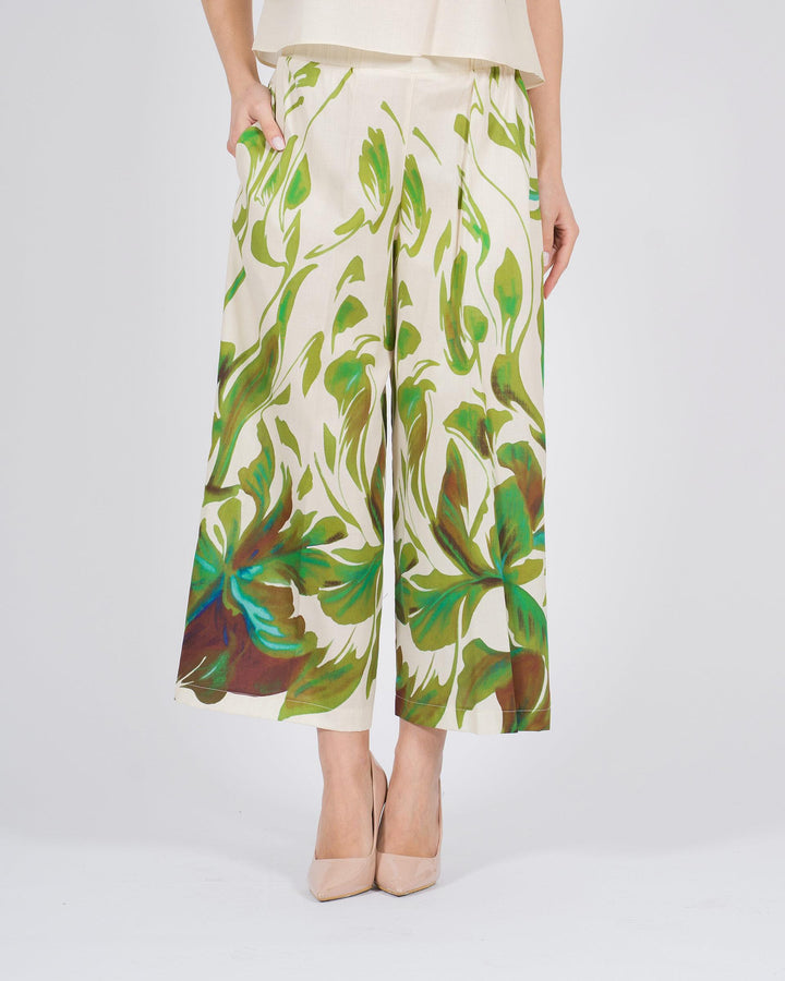 Pantalone Gaucho con stampa floreale verde su fondo bianco 