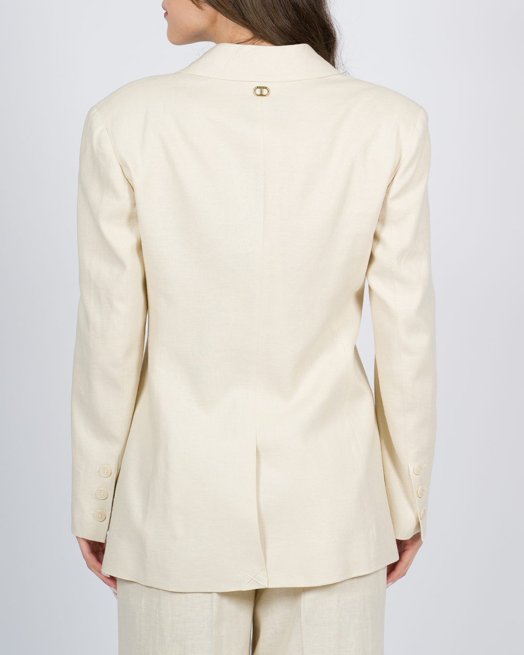 Pantaloni flare in crêpe fluido panna 