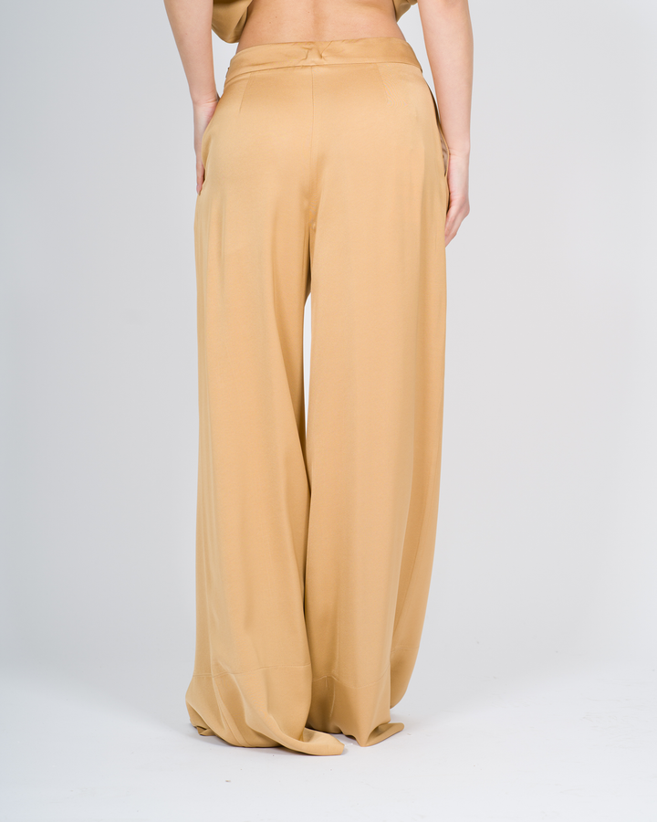 Pantaloni con cuciture decorative ocra 