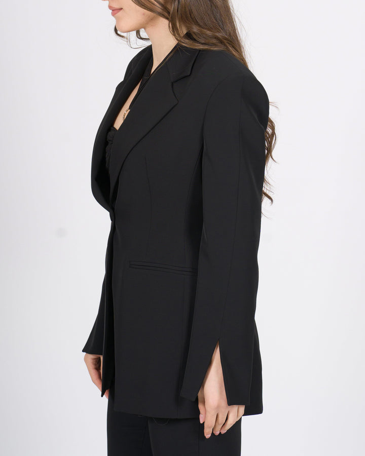 Giacca Silence nera slim fit con rever a lancia. 
