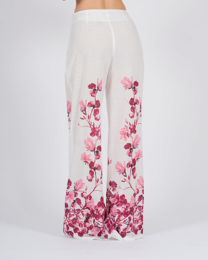 Pantalone Palazzo bianco con stampa floreale fucsia 