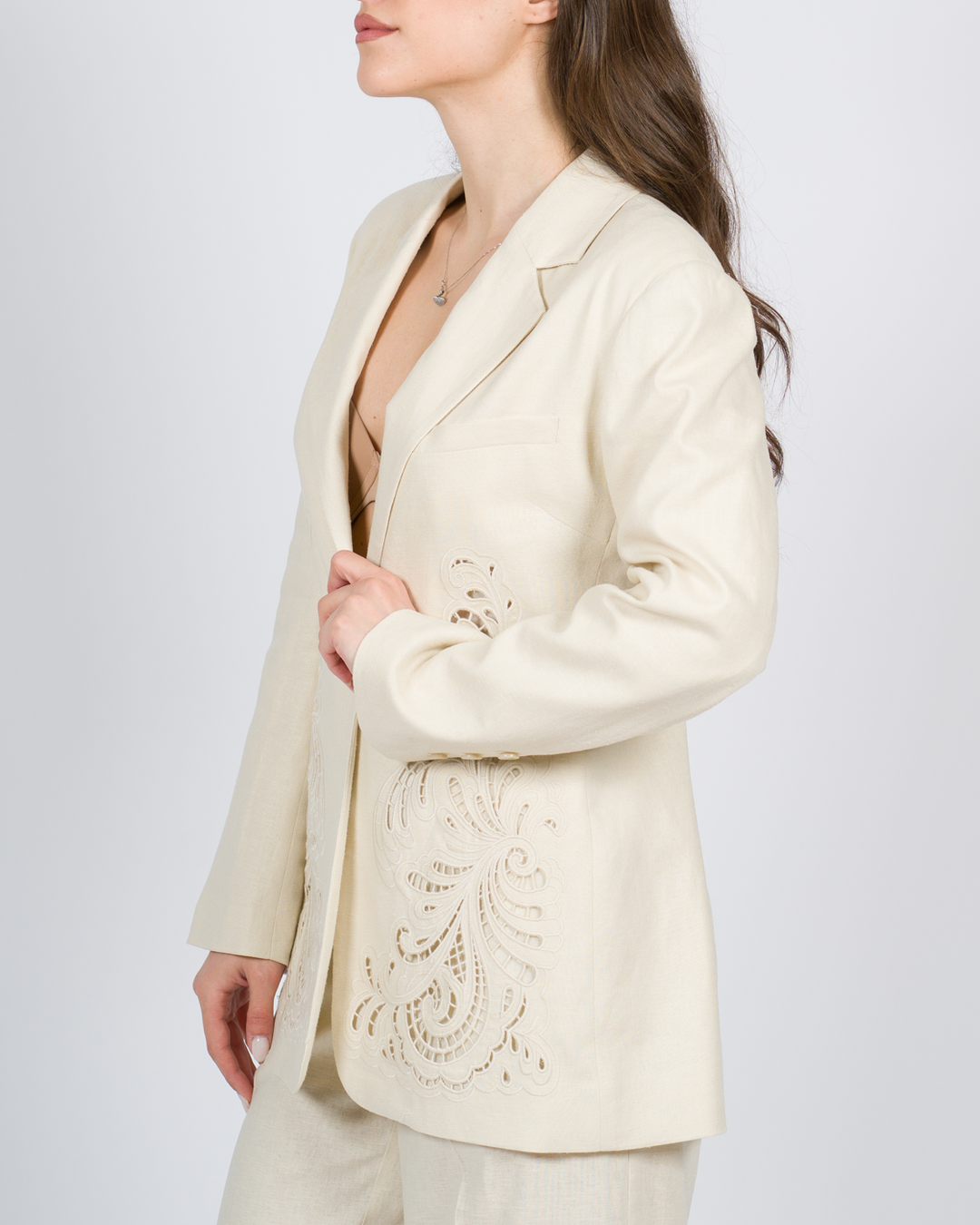 Pantaloni flare in crêpe fluido panna 