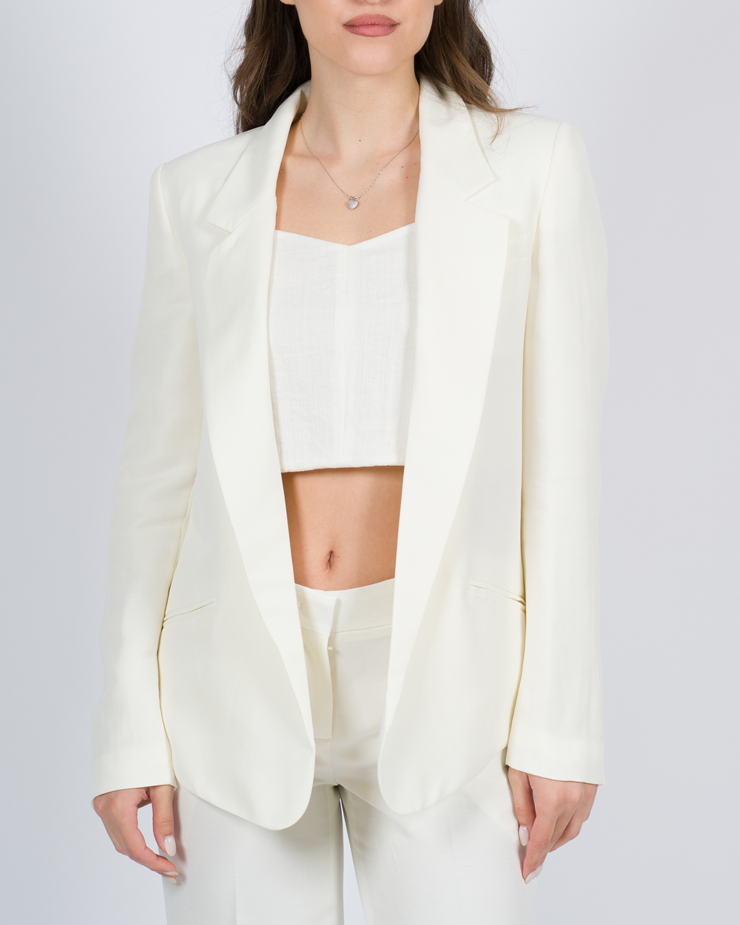 Giacca blazer con fondo arrotondato bianco 