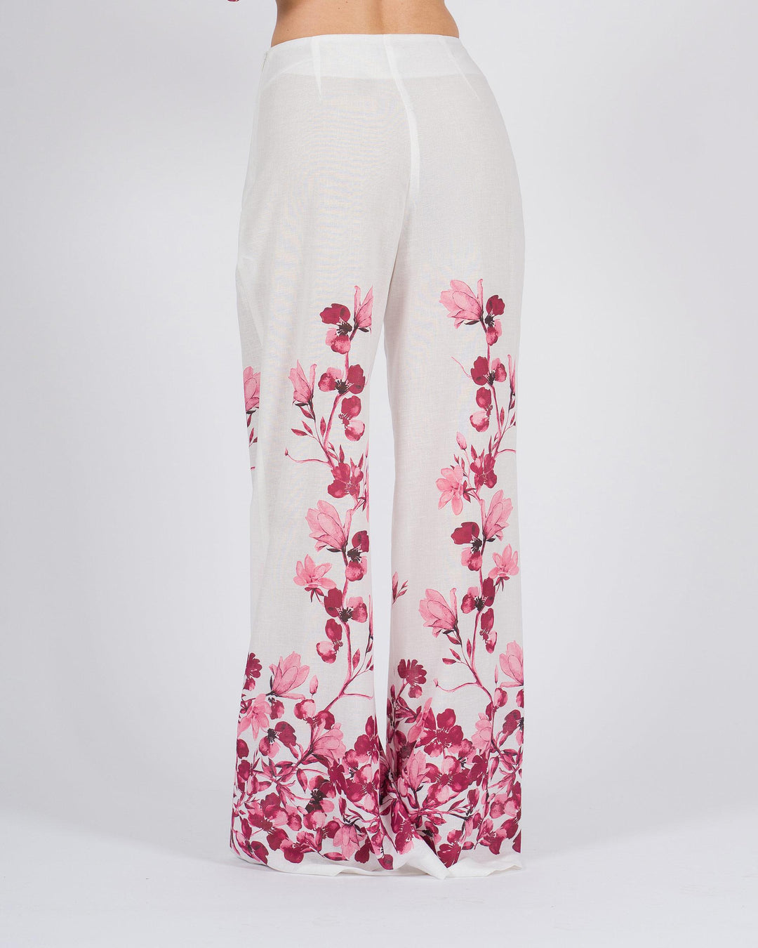 Pantalone Palazzo bianco con stampa floreale fucsia 