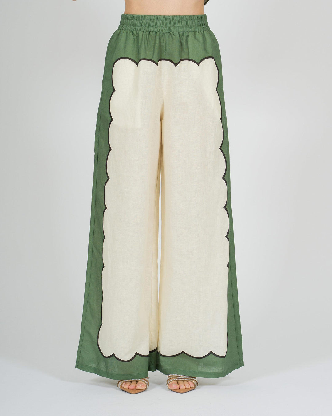 Pantalone panna in lino con stampa verde laterale 