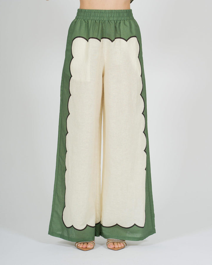 Pantalone panna in lino con stampa verde laterale 