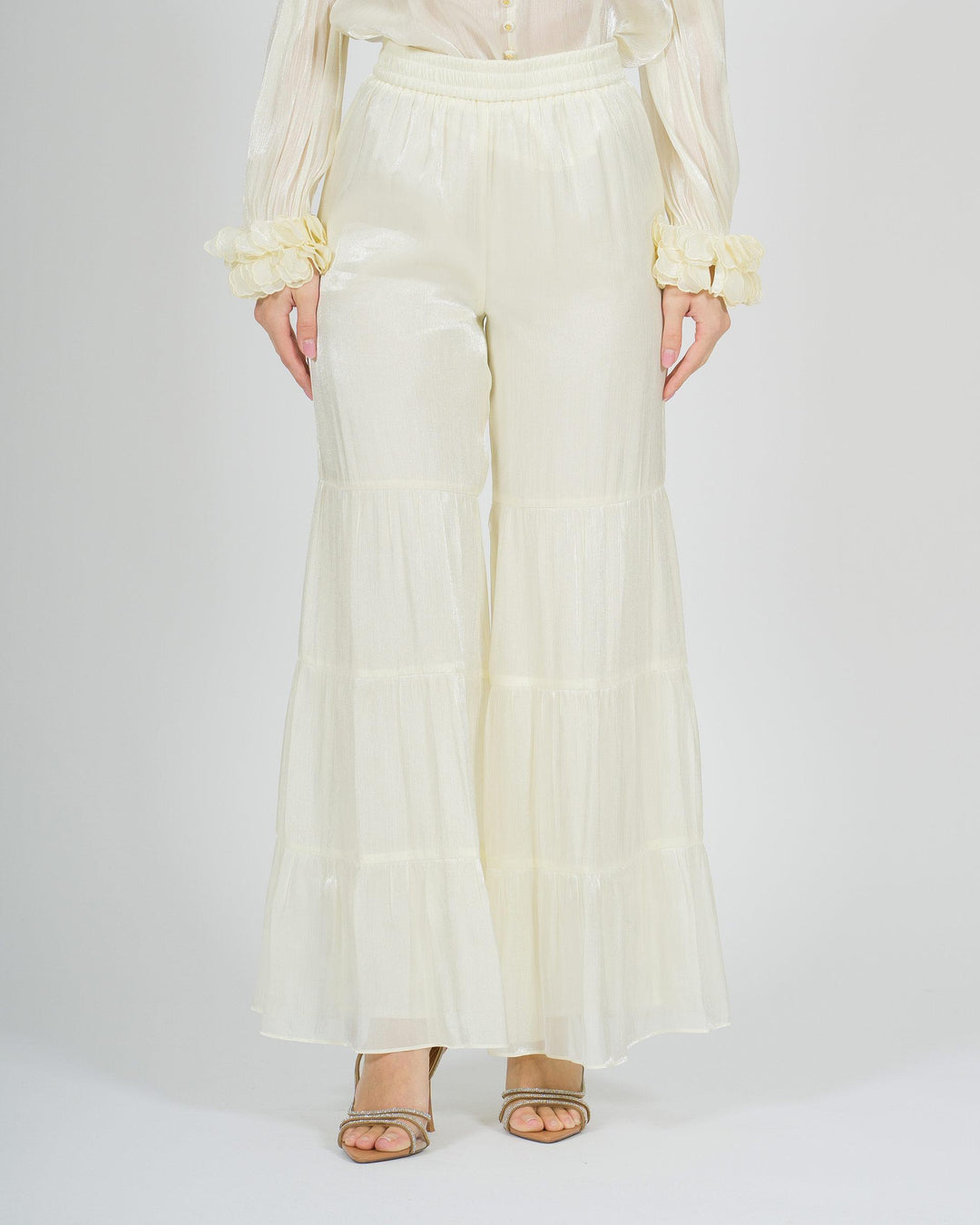 Pantalone panna amosa  modello zampa con balze 