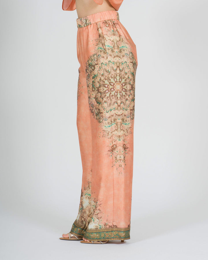 Pantalone amosa arancio in raso modello palazzo con stampa 