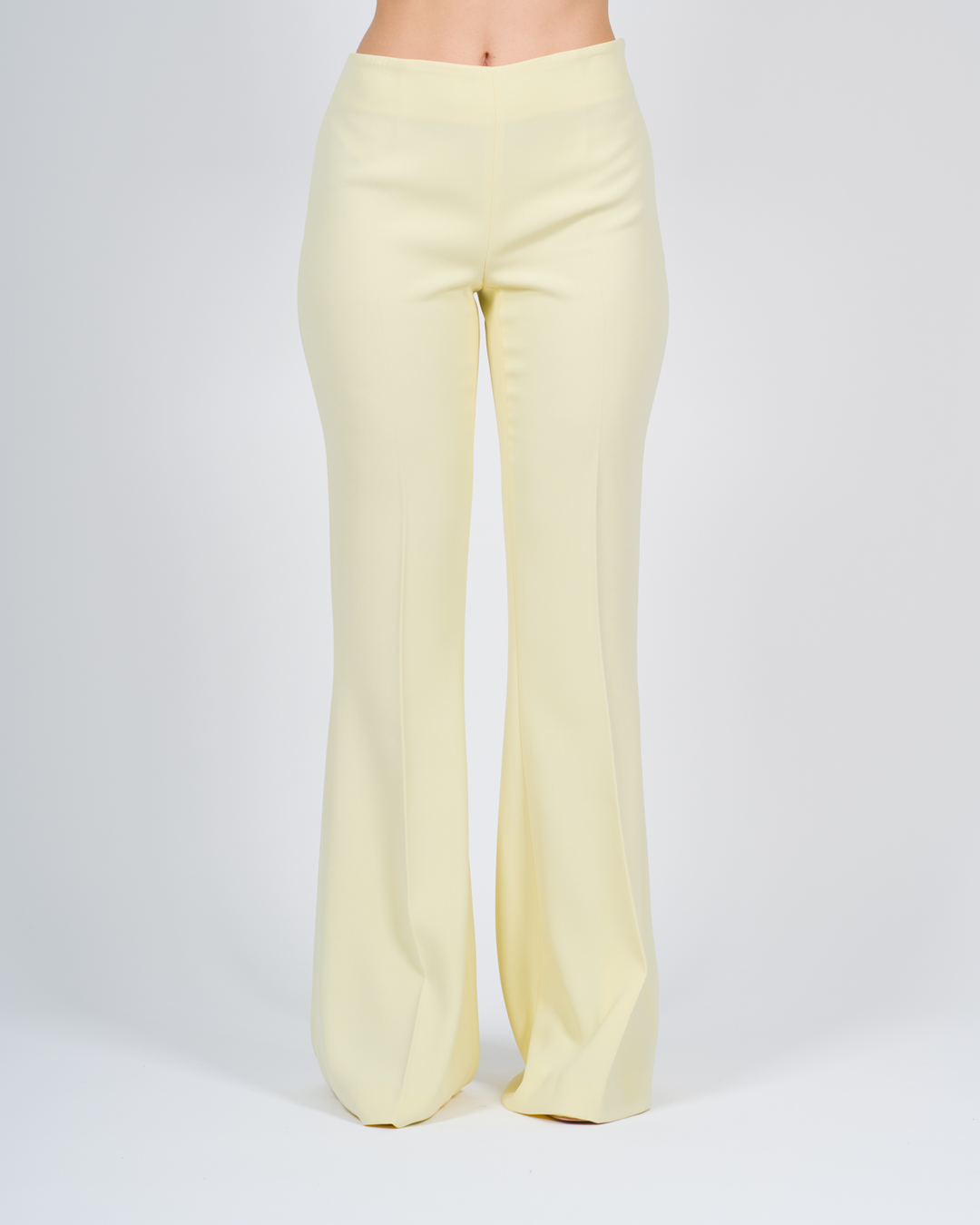 Pantaloni flare in crêpe fluido beige 