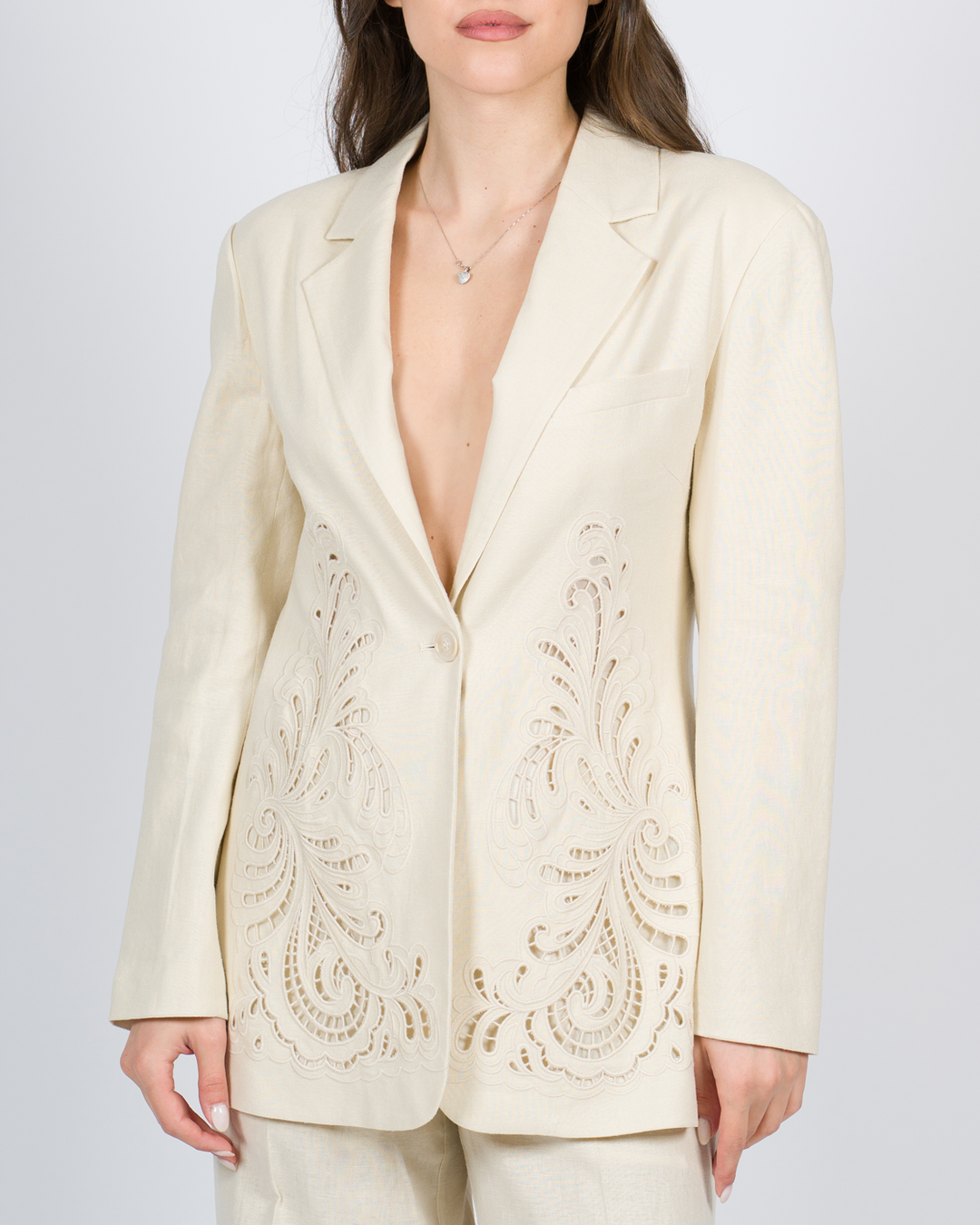 Pantaloni flare in crêpe fluido panna 