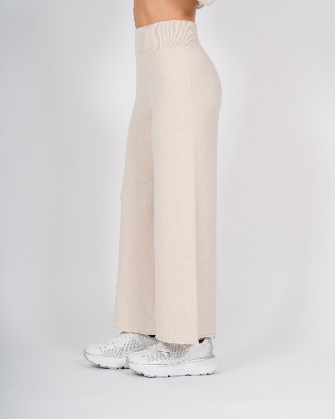 Pantaloni in lana a gamba larga beige 
