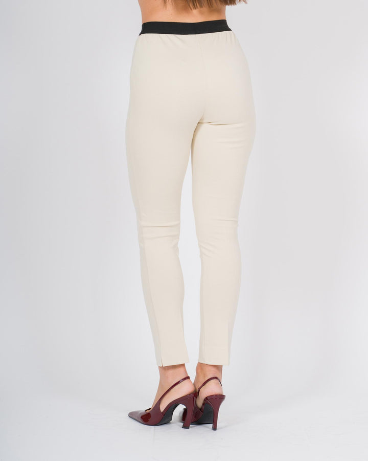 Pantalone bianco skinny con bustino in contrasto 