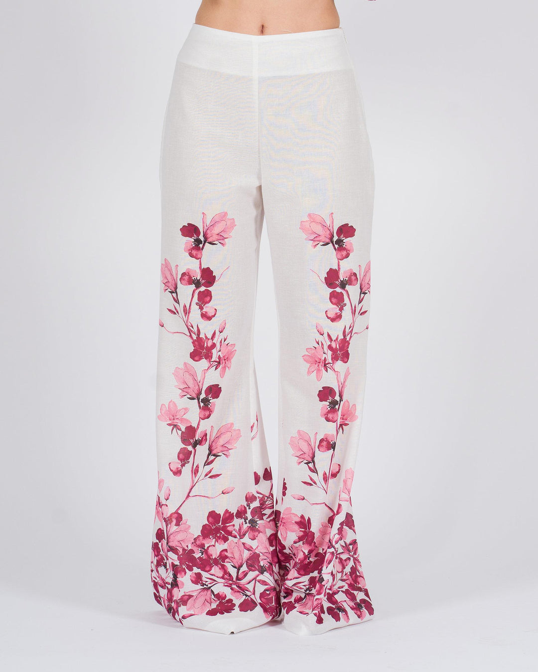 Pantalone Palazzo bianco con stampa floreale fucsia 