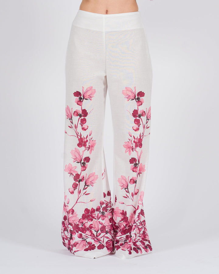 Pantalone Palazzo bianco con stampa floreale fucsia 