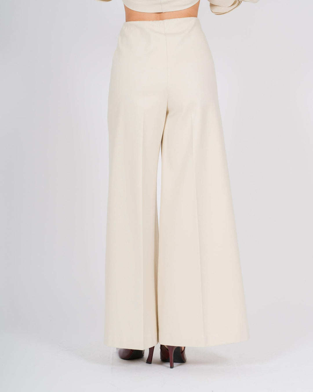 Pantalone largo in jersey panna con bustino elastico 