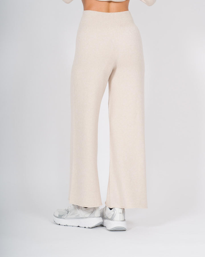 Pantaloni in lana a gamba larga beige 