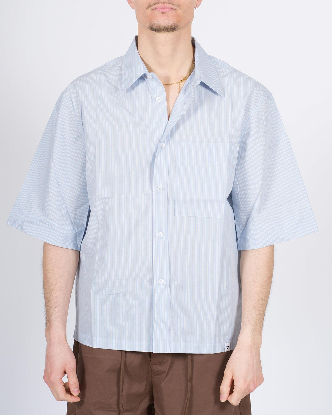 Camicia mezza manica azzurra con taschino 